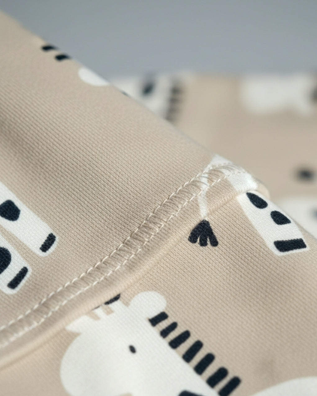Close-up of fabric with zebra pattern on a beige background