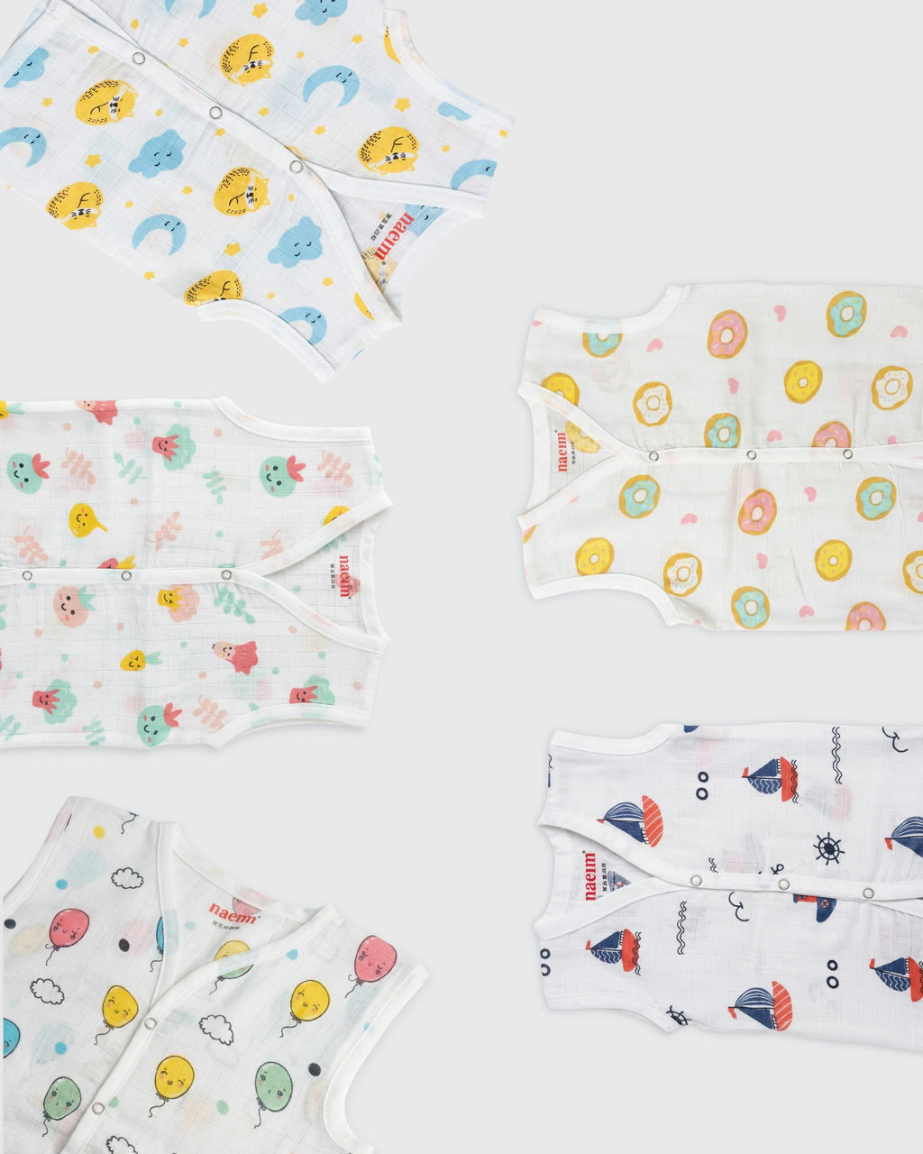 Collection of baby muslin jabla set with various patterns on a white background