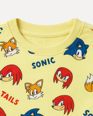 Yellow shirt with Sonic the Hedgehog character faces on a white background
