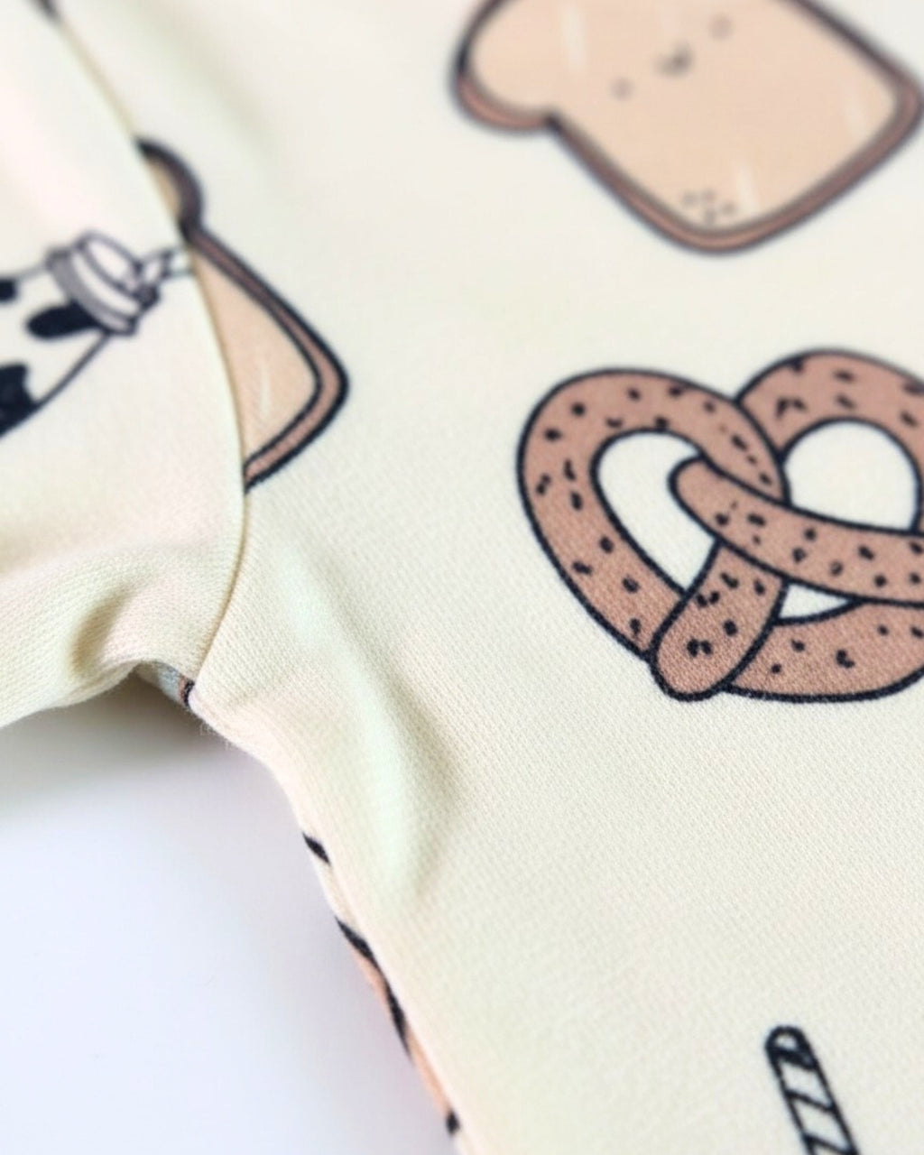 Close-up of a fabric with a pretzel design on a white background