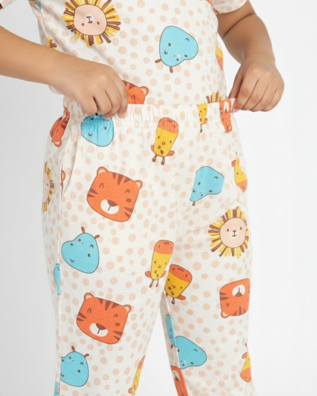 Children's pajama pant with colorful animal prints on a plain background