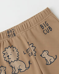 Brown shorts with lion illustrations and 'BIG CUB' text on a white background