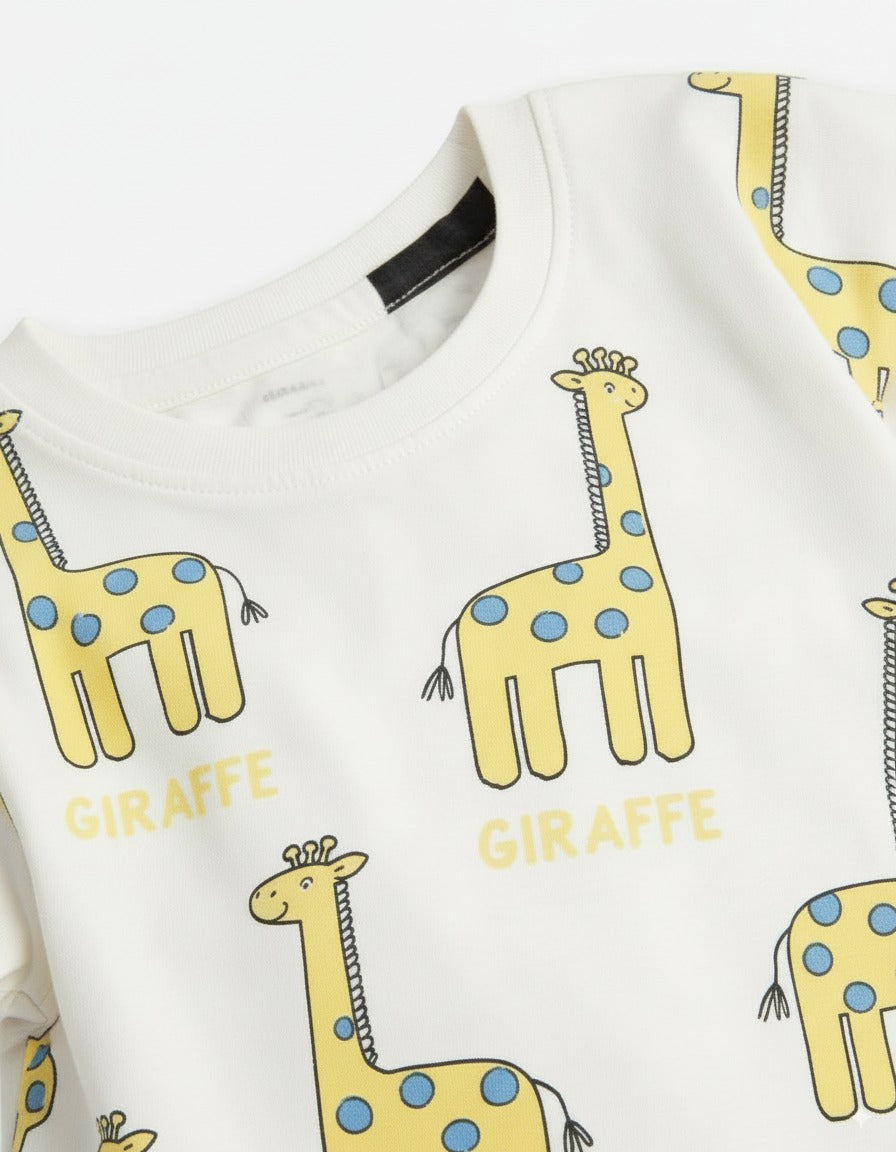 White shirt with yellow giraffe prints and 'Giraffe' text on a white background
